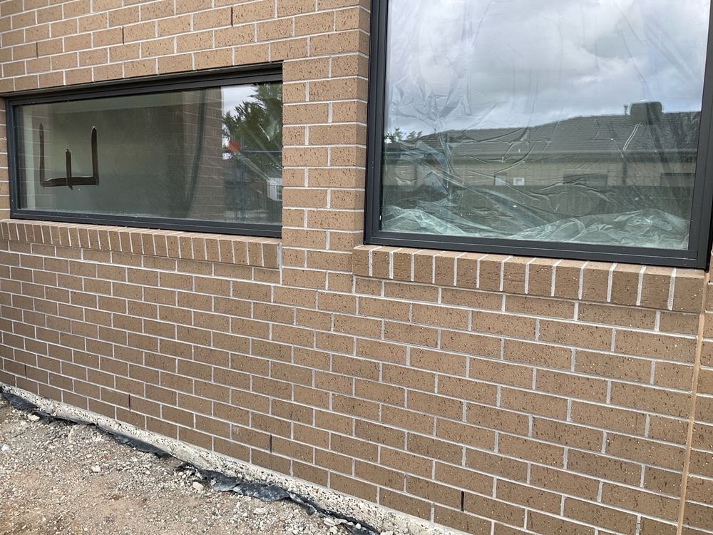 Window sealing and flashing incomplete, recorded on a fixing stage inspection in Fraser Rise
