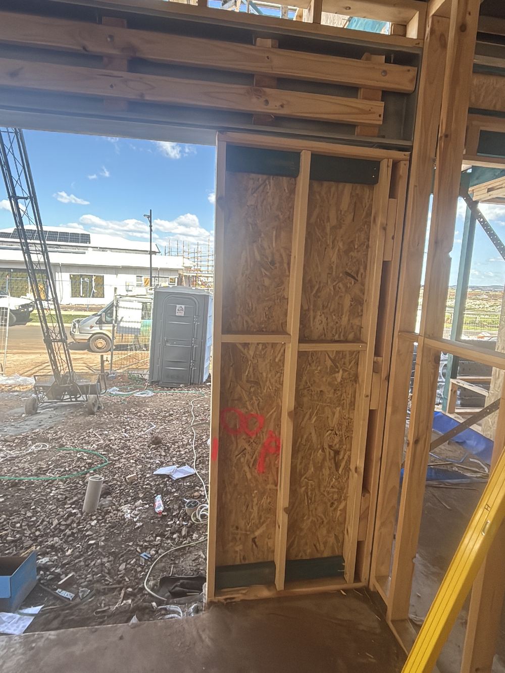 Wall frame out of plumb in a garage, recorded on a frame inspection in Fraser Rise
