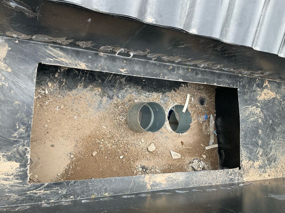 Non-compliant box gutter overflow, recorded on a pre-handover inspection in Fraser Rise