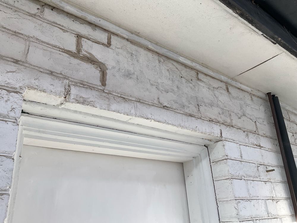 Previous repairs to masonry, recorded on a pre-purchase inspection in Newport